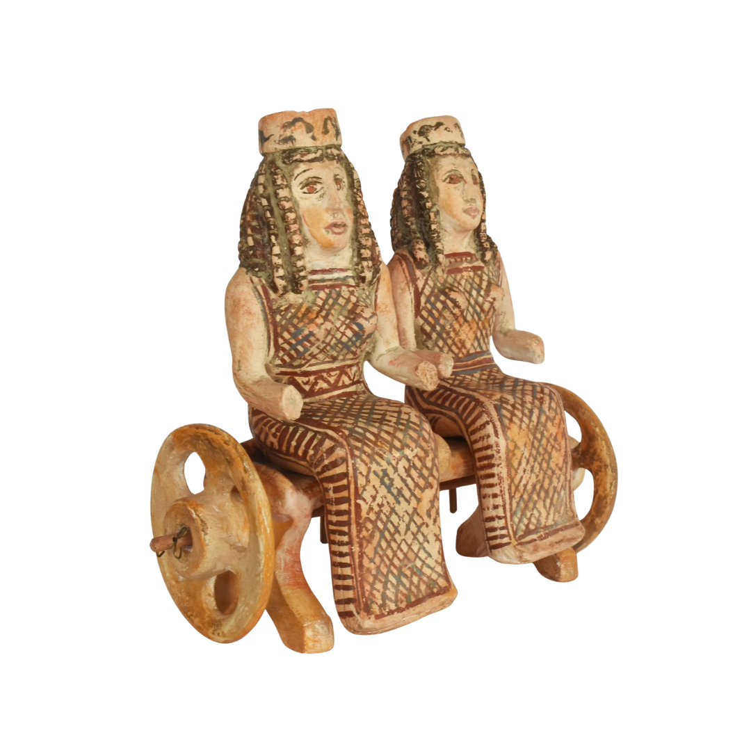 Sculpture "Deux femmes assises dans un véhicule à roues"